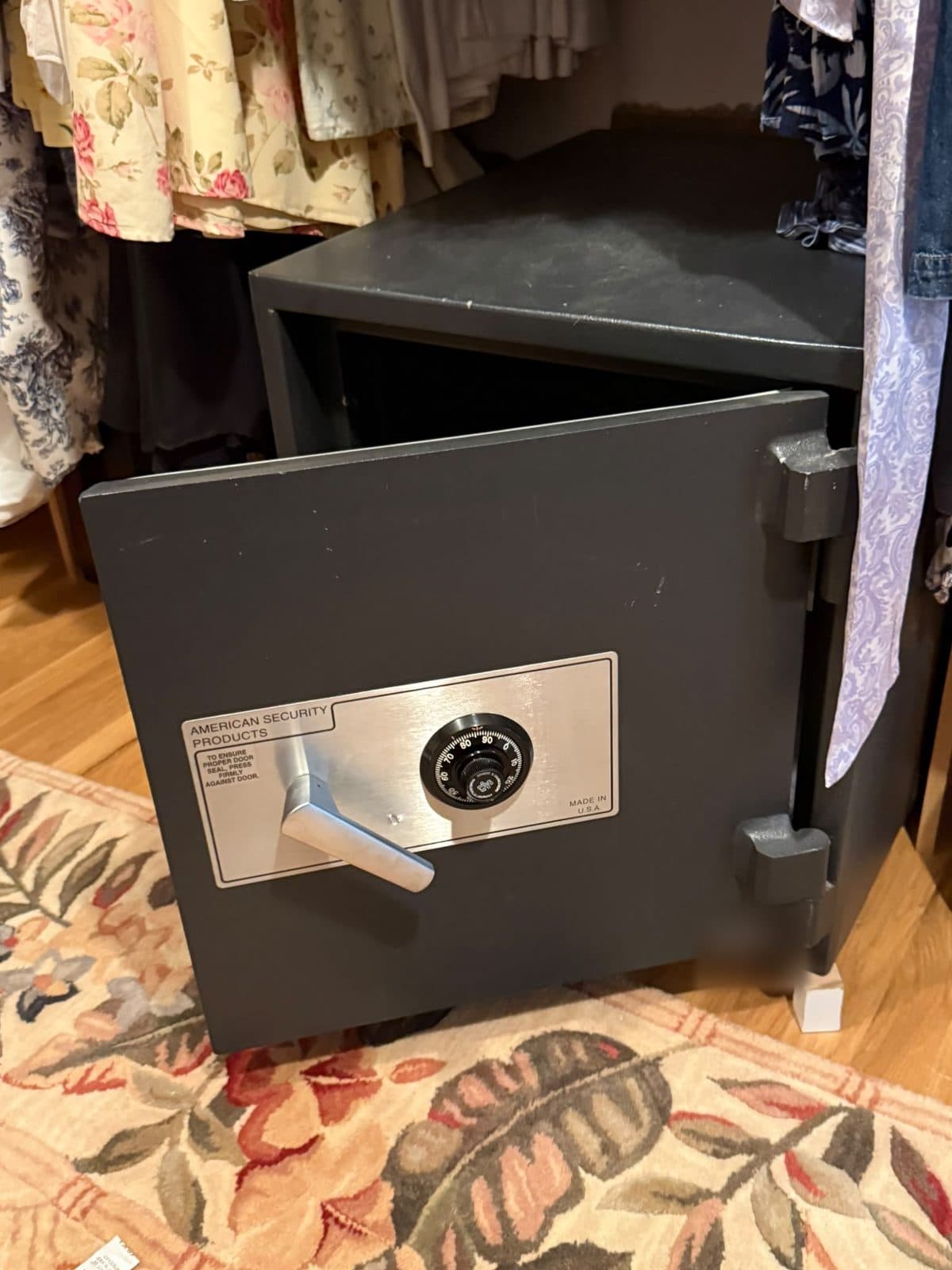 An American Security home safe opened in a closet