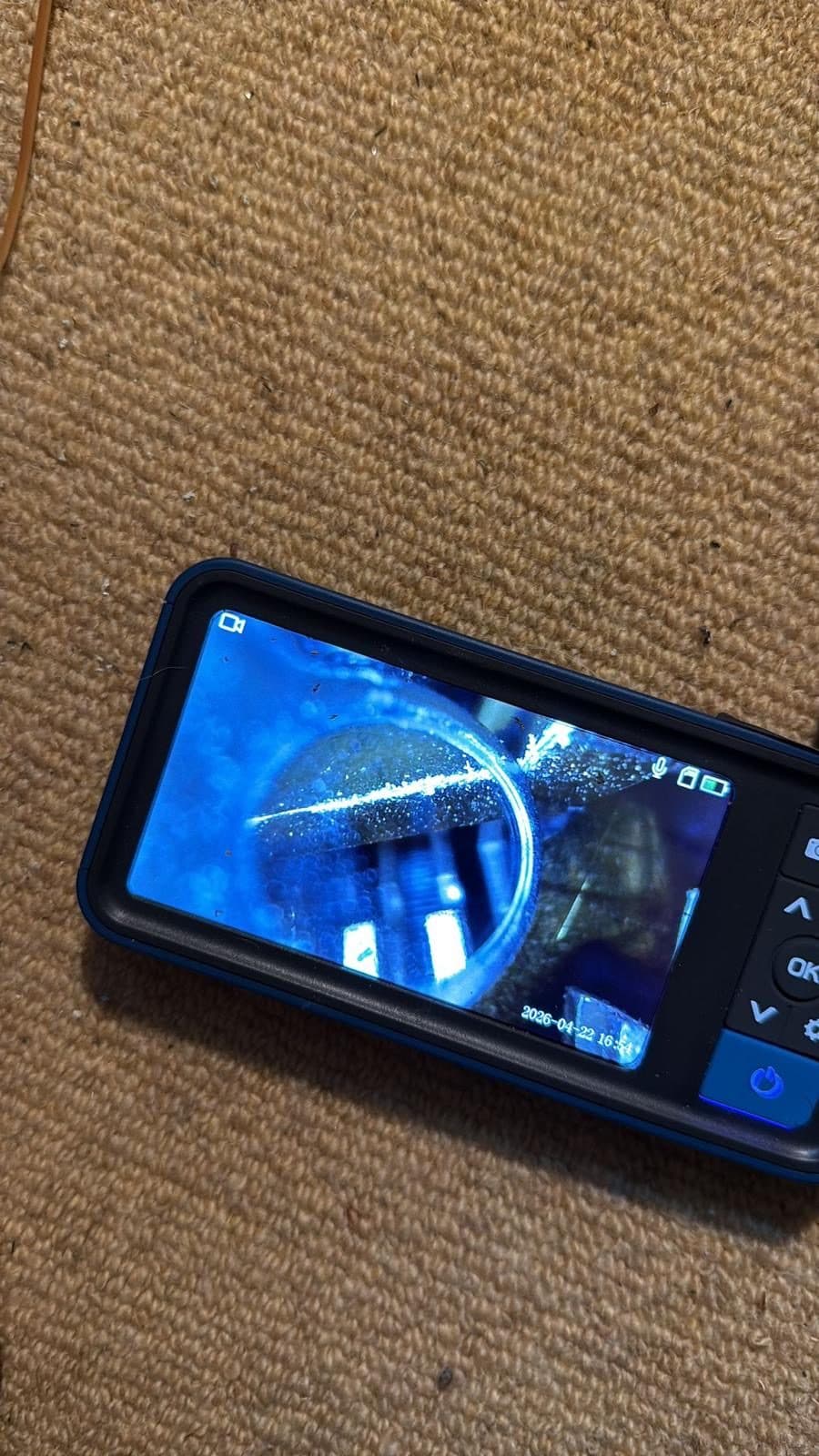 Borescope screen showing the inside of a safe lock