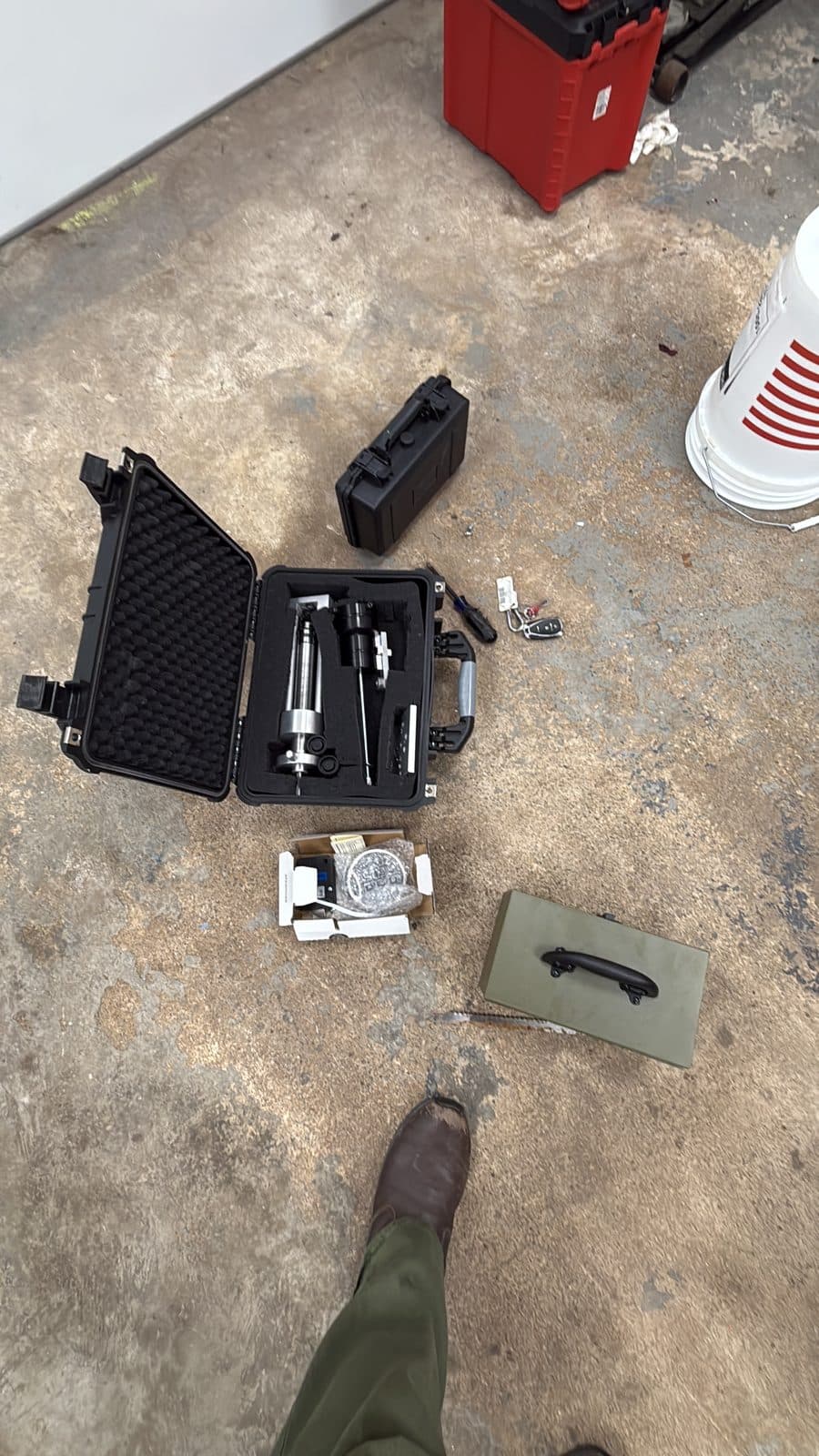 Amit's tool case open on a shop floor